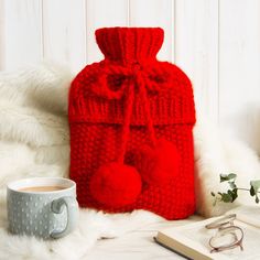 Hot Water Bottle Cover Knitting Kit. Combat the winter chill with our Hot Water Bottle Cover knitting kit. Perfect for cuddling up with on cold winter evenings on the sofa or in bed, this hot water bottle will make a great handmade gift or be a special treat for yourself.  Made with our merino Cheeky Chunky yarn, this hot water bottle cover is super soft and quick to knit up.  This pattern has been designed as an 'easy' level kit, perfect for the crafter who knows the knitting basics and is look Knitting Pattern For Hot Water Bottle Cover, Crochet Hot Water Bottle Cover Chunky, Free Knitting Pattern For Hot Water Bottle Cover, Free Knitting Patterns For Hot Water Bottle Covers, Wet Felted Hot Water Bottle Cover, Wooden Knitting Needles, Crochet Store, Knitting Basics, Knitting Kit