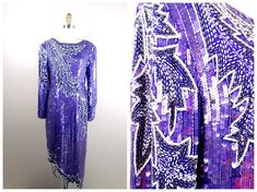 "This is a STUNNING vintage dress fully embellished with sequins and glass beading. It's in perfect condition! Measurements: Bust - 36\" Waist - 30\" Hips - 38\" Length - 35-47\" Tag Size - 8 (fits like a medium) This dress comes from a pet-free and smoke-free home. If you would like more info or have any questions, please don't hesitate to ask!" Pretty In Purple, Iridescent Dress, Beaded Blouse, Sequined Dress, Dress Purple, Sequin Top, Embellished Dress, Beaded Dress, Large Size Dresses