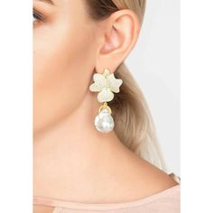 These Baroque Pearl White Flower Drop Earrings Gold are a lovely addition to any outfit. These earrings feature beautiful floral tips encrusted with sparkling cubic zirconia and dangling baroque pearls. They're pierced earrings with post backs and butterfly fastenings. Made from 925 sterling silver and dipped in lavish 22ct gold. They are 5.5cm long and 3cm wide, and weigh approximately 26g. These beautiful earrings are a great wedding accessory. They combine the beauty of flowers with the purit White Flower Earrings, White Flower Earring, Beauty Of Flowers, Gold Baroque, Flower Drop Earrings, Drop Earrings Gold, Wedding Accessory, Flower Tops, Flower Beauty