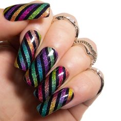 Rainbow. Glitter. Ombre. Stripes. Holographic.  Who'd have thought that you could put all of that into one set and not have it be a hot mess?  Me, of course!  And not to sound too big-headed, but I think I've really pulled it off.  With holographic glitter in every single colour of the rainbow nestled between bold black stripes, this is one nail set that just keeps on giving and giving.    *Shown here in Long Square tip shape. ♦ Set of 10 or 20 nails. ♥ Shipped in a stunning clear plastic gift b Rainbow Glitter Nails, Circus Nails, Tapered Coffin, Chrome Nail Design, Holographic Nail Designs, Neon Nail Art Designs, Chrome Manicure, Rainbow Nails Design, Chrome Nail Polish