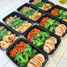 six plastic trays filled with different types of food on top of a white counter