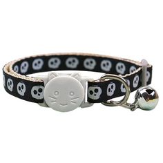 a black and white cat collar with skulls on it