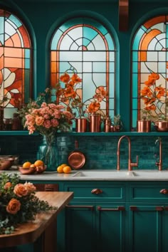 Step into an eclectic kitchen sanctuary where copper fixtures and stained glass windows conjure a feast for the senses. Teal cabinetry complements the copper sink and faucet, creating a vibrant backdrop. The enthralling stained glass windows framed in copper infuse the space with charm. Lush florals in copper pots and fresh citrus fruits add a burst of nature’s bounty. With a subway tile backsplash, this kitchen is an alluring blend of vintage elegance, vibrant hues, and heartwarming coziness. Teal And Copper Kitchen Interior Design, Teal And Rust Kitchen, Teal Copper Living Room, Teal Orange Kitchen, Copper Kitchen Cabinets, Orange And Teal Kitchen, Copper And Green Kitchen