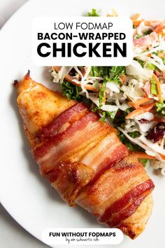 bacon wrapped chicken on a white plate with coleslaw