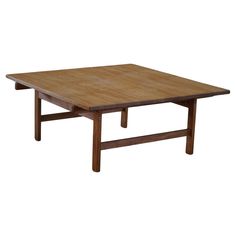 a wooden table sitting on top of a white background