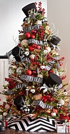 a christmas tree decorated with black and red ornaments