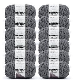 six skeins of bernnat yarn in grey