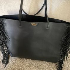 Brand New Condition Victoria's Secret Black Travel Shoulder Bag, Victoria's Secret Black Shoulder Bag For Travel, Chic Victoria's Secret Bags For On-the-go, Chic Victoria's Secret Shoulder Bag For On-the-go, Black Rectangular Bag With Fringe, Trendy Victoria's Secret Black Shoulder Bag, Trendy Black Victoria's Secret Shoulder Bag, Black Fringe Shoulder Bag For Travel, Chic Large Capacity Victoria's Secret Shoulder Bag