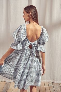 This must-have baby doll mini dress is the perfect combination of beauty and sweetness, embroidered with a gingham floral pattern. It features a square neckline, puffy 3/4 length sleeves with ruffled cuffs, and an open back with a self-tie bow. This gingham dress is sure to be the perfect addition to any picnic, spring and summer or everyday outfit. Material:Cotton Gingham Dress Outfit, Babydoll Dress Outfit, Picnic Spring, Blue White Fabric, Gingham Outfit, Blue Gingham Dress, Picnic Dress, Blue Gingham, Gingham Dress