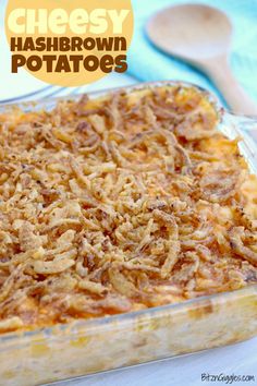 a cheesy hashbrown potato casserole in a glass baking dish