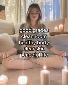 a woman sitting on the floor with candles in front of her and text that reads,'go glades clean room healthy body clear skin peaceful life