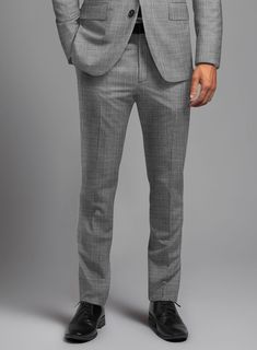 Express your unique flair and grace with the London Loom Gray Eufemia Wool Silk Linen Pants. Crafted from a harmonious blend of premium wool, luxurious silk, and breathable linen, this ensemble ensures both comfort and elegance. The distinguished shade of gray and solid pattern are accentuated by impeccable craftsmanship. Seamlessly transitioning from high-stakes boardroom presentations to exclusive social gatherings, this pants serves as a symbol of distinction and refinement.   The London Loom Collection  masterfully blends the durability of wool, the luxury of silk, and the breathability of linen, reflecting the elegance of English tailoring. This fabric offers season-spanning comfort, refined drapes, and natural coolness. Woven with traditional expertise, it stands as a testament to qu Shade Of Gray, Italian Shirts, Tweed Pants, Linen Suits, Linen Jackets, Tweed Suits, High Stakes, Tuxedo Shirts, Silk Linen