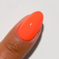 A hot orange. The duo includes: 1 Soak-Off Gel Size: 0.5 fl oz 1 Nail Lacquer Size: 0.5 fl oz Color Accuracy: The duo comes with 1 lacquer and 1 gel in matching colors. We do not guarantee matching exact colors due to differences in formulation, ingredients, and batch. Benefits: Lasts up to 21 days LED and UV cured Made in USA Wide range of colors Fused with vitamins that make nails stronger, healthier and stunning for weeks HOW TO: Gel Polish Application - Prep your nails - Remove old nail polish and oil. Push back cuticles gently using a cuticle pusher. Apply 1st thin layer of base coat and cure under a lamp for 30-45 seconds Apply a thin layer of the DND Gel Polish. Cure under UV/LED lamp for 30-60 seconds. Repeat 2-3 coats if needed. Apply a top coat and cure under UV/LED for 30-45 sec Uñas Color Coral, Nails Stronger, Make Nails, Nail Salon Supplies, Old Nail Polish, Nail Tip Designs, Band Nails, Dnd Gel Polish, Gel Lacquer