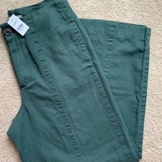 Brand New Loft Wide-Leg Pants. Size 2 With 26” Inseam. Beautiful Green Color With Zipper And Button Closure. Trendy Green Bottoms With Button Closure, Trendy Green Bottoms With Buttons, Non-stretch Mid-rise Green Pants, Green Mid-rise Pants For Work, Trendy Green Pants With Button Closure, Green Wide Leg Pants With Button Closure, Green Bottoms With Buttons For Fall, Green Mid-rise Bottoms For Work, Green Fall Bottoms With Buttons