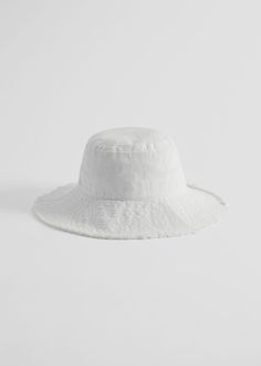 Classic bucket hat crafted in crisp cotton featuring topstitch detailing and fringed edges. Bucket Hat White, Bucket Hats, Timeless Treasures, Fashion Story, Vintage Jeans, Hat Crafts, Recycled Cotton, Feminine Style, Access Denied