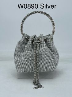 New Vintage Women Evening Clutch Bag Rhinestone Crystal Bucket Party Purse Tassel/Silver 0890 This brand new elegant bag is perfect for brides and bridesmaids. perfect for wedding party. It is made with Rhinestone vintage style. Very fashionable design and new arrival, this bag comes with a long metal strap . you can exchange the straps to use it as shoulder bag, purse and clutch. Match any dress. Product Features: *  Stunning Evening Bags With Simple & Elegant Style, the hottest bag, can be use Sparkle Bag, Bling Bags, Silver Bags, Luxury Belts, Jimmy Choo Bag, Party Purse, Satin Pumps, Bon Bon, Silver Crystal