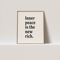 a black and white print with the words inner peace is the new rich on it