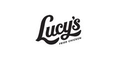 the logo for lucky's fried chicken is shown in black on a white background