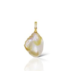 This pendant showcases a captivating gold-flecked baroque pearl, with its natural, unique shape and delicate gold specks, ensuring every piece is one of a kind. The pendant clasp can be opened for added versatility. Paired with a classic white pearl necklace, the combination creates a timeless and elegant contrast. Complete your look with matching earrings from the collection. Composition: Gold Filled/pearl/zircon Handle Gently: Avoid contact with perfumes, cosmetics, and harsh chemicals. Show L Baroque Pearl Pendant, September Birthstone Jewelry, Detailed Necklace, White Pearl Necklace, Baroque Pearl Necklace, Ceramic Earring, Gold Flecks, Gold Jewelry Necklace, Pearl Jewellery Earrings