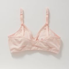 A more supportive style for larger cup sizes. Horizontal seams across the cups, fabric front straps and other thoughtful details shape and support—without sacrificing style or comfort. Designed with measurements from real women, not mannequins. Supports A-D cups. Slip-on style, no back closure. Adjustable straps with rose gold hardware. Double-layered, organic cotton with a covered elastic band. 94% organic cotton, 6% spandex. Cut and sewn in the U.S. Machine wash and dry. Size Guide Solid Full Coverage Nursing Bra With Padded Cups, Full Coverage Nursing Bra With Padded Cups, Fitted Full Coverage Nursing Bra With Adjustable Straps, Everyday Bra With Padded Cups, Fitted Nursing Bra With Removable Pads For Everyday, Fitted Full Coverage Sports Bra With Adjustable Straps, Fitted Full Cup Sports Bra, Fitted Full Cup Sports Bra With Built-in Bra, Supportive Nursing Bra For Everyday Use