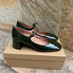 Glossy Patent Leather Mary-Jane Pumps Set On A Walkable Block Heel. Patent Leather Upper Square Toe Adjustable Buckle Strap Closure Leather Padded Insole Rubber Sole Imported Block Heel, 2" (50mm) Green Mary Janes, Green Bottle, Mary Jane Pumps, Mary Jane Heels, Leather Mary Janes, Dream Shoes, Cardiff, Mary Janes, Shoes Women Heels