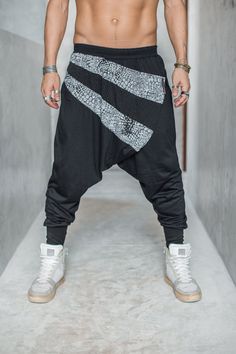 "NINJA WARRIOR AGUNG (Tencel) Stylish harem drop crotch pants with soft and elegant tencel fabric and impressive black and white snake skin pattern front details - a great addition to your festival outfit and goes perfectly with many different daily outfit options. Fabric is quality 100% Tencel on the body, snake pattern details are made of cotton. TIP Combine these Ninja Warriors with Tencel Agung Kimonos, an impeccable outfit for many special moments COLORS * Black * Khaki Brown SIZING: S/M (f Black And White Snake, Samurai Pants, Harem Pants Men, Snake Skin Pattern, Drop Crotch Pants, White Snake, Skin Pattern, Ninja Warrior, Summer Pants