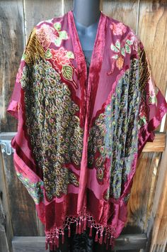 Welcome to Paradox Moon!  I am listing gorgeous pieces that are ideal for evenings out and holiday events.  This stunning hand beaded velvet burnout kimono is done in burgundy with peacocks in beautiful colors.  It is trimmed at the bottom with beaded tassel trim…beautiful!  This kimono will go with lots of solid colors, and is the perfect “belle of the ball” piece! It is One Size, and should fit a range of sizes but please go by measurements for best fit.  By Vintage Rose, 100% silk bottom with Burnout Art, Beaded Peacock, Velvet Burnout, Rayon Top, Silk Bottoms, Holiday Events, Advanced Style, Art To Wear, Vintage Rose