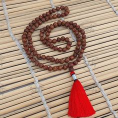 This attractive and powerful Japa Mala is made with Rudraksha bead that are naturally stained and oiled to achieve their beautiful Antique color and aged appearance. 📿Mala Beads, or Buddhist prayer beads, are a set of sacred rosary beads for chanting & counting mantras, meditation, prayer, yoga & reflection. Mala is a Sanskrit word meaning garland. The Tibetan word for mala is threngwa (Tibetan ཕྲེང་བ) . Seed malas are some of the most common malas used in Tibet and Nepal. Buddhist Prayer Beads Rudraksha Mala, Rudraksha Beads, Meditation Prayer, Mala Meditation, Silk Gifts, Buddhist Prayer, Sanskrit Words, Word Meaning, Rosary Beads