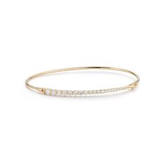 Delicate and easy to style, the Lunado Cuff provides a subtle sparkle to your collection. The graduating diamond silhouette is inspired by the sophistication and elegance of the crescent moon. Handcrafted in 18-Karat gold and featuring 0.85tcw of round, brilliant-cut diamonds, the Lunado Cuff is easily put on with it's hook closure. Easy to dress up or down, the Lunado Cuff can be paired with more casual gold pieces like the Tatum Chain Bracelet and Sophisticate Bangle or heavier diamond pieces like the Phoebe Bracelet or the Penelope Bracelet for a show stopping going out look. MATERIALS & MEASUREMENTS Handcrafted in 18-Karat Gold 0.78 total carat weight 16 - 17 cm diameter Signature Matte Finish Made in New York City STYLE JT1025C Diamond Silhouette, Diamond Chain Bracelet, Useless Things, Bespoke Engagement Ring, Heart Necklace Diamond, Gold Bracelet Cuff, Heart Shaped Diamond, Gold Cuffs, Diamond Chain