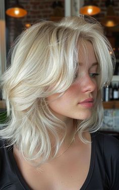 Looking for a new look? Try one of these trendy platinum blonde hairstyles that are perfect for a fresh makeover. Click to see the top styles for this season! Blonde And Copper Short Hair, Blonde 80s Hair, Frosted Tips Women Hair, Anne Core, Frosted Tips, Platinum Blonde Hair Color, Hair Inspiration Short, Blowout Hair, Blonde Hair Inspiration