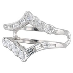 two white gold rings with diamonds on them