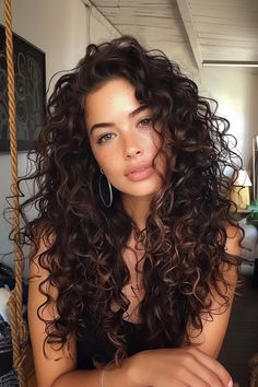 Your natural brown long curly hair is a stunning testament to effortless beauty and timeless elegance. The rich brown color, paired with those gorgeous curls, creates a look that's both sophisticated and carefree. Perm Types, Long Curly Haircuts, Permed Hairstyles