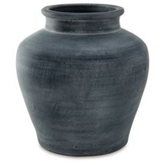 a black vase is shown on a white background