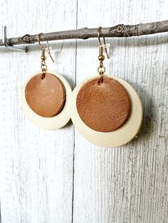 Pretty, Lightweight Two-Toned, Leather-on-Leather Circle Earrings made from Repurposed Leather:  Saddle Brown on Beige w/ Gold-toned Hardware Small: 25 cm leather, 1.75 inches / 45 cm Drop Large: 35 cm leather, 2.25 inches / 55 cm Drop Nickel free.  Packaged on branded back cards. *We at KardiKlips prioritize sustainability + eco-friendly practices - we love our beautiful planet and want to do our part to ensure it remains for many generations to come! We also believe in making things beautiful, Beige Dangle Earrings For Everyday, Beige Dangle Jewelry For Everyday, Beige Leather Jewelry, Adjustable Beige Earrings For Everyday, Everyday Beige Dangle Earrings, Everyday Beige Dangle Jewelry, Adjustable Nickel-free Beige Earrings, Handmade Leather Jewelry, Leather Jewelry Diy