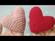 two crocheted hearts are held in their hands