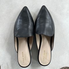 Cole Haan, Never Worn, 1” Heel, Pointed Toe, Size 7b Mules, Black Closed Toe Flats For Work, Black Closed-toe Flats For Work, Black Leather Footbed Flats For Work, Casual Pointed Toe Faux Leather Mules, Flat Heel Faux Leather Mules For Work, Black Flat Heel Mules For Business, Flat Mules With Cushioned Footbed For Workwear, Black Synthetic Flats For Work, Flat Faux Leather Mules For Work