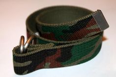 Men's camouflage webbing belt is perfect for every person who needs help keeping their pants up. This version of the belt has a 1 and 1/4 inch wide webbing and can be made in any size. Options for closure are shiny nickel d ring, matte d ring or an antiqued slide buckle. Matte d ring shown and slide buckle in the last photo.The tail end can have a sewn end, a matching metal tab added or the webbing will be frayed (treated to prevent the entire belt from fraying). Please make sure to choose a bel Tennis Team Gifts, Camo Fabric, Military Belt, D Ring Belt, Kids Belt, Ring Belt, Webbing Belt, Team Gifts, Suspender Belt