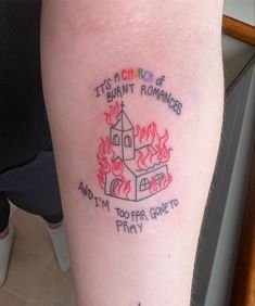 photo of a tattoo below the inside of elbow.  fine line church with flames with “it’s a church of burnt romances and i’m too far gone to pray” around the church.  the word “church” is in rainbow colours Louis Tomlinson Stag Tattoo, Louis Tomlinson Lyric Tattoos, Louis Tomlinson Tattoos Ideas, One Direction Tattoos Ideas, Hs Tattoo, Only The Brave Tattoo, Tatu Ideas