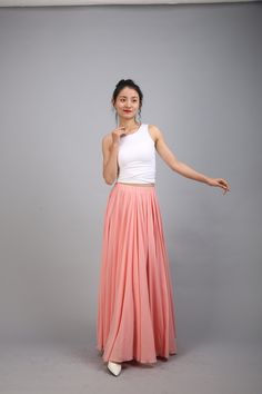 100 Colors Chiffon High Quality Orange Pink Long Party Skirt Evening Wedding Lightweight Summer Holiday Beach Bridesmaid Maxi Skirt Detail Info: ❤ Color: Orange Pink color as picture. More color choice is as follows, https://www.etsy.com/listing/213656440/chiffon-dress-color-card?ref=shop_home_feat_1 Please just note the color you want with order. ❤ Material: Chiffon Size: The length is from waist to bottom, please choose as you like. ❤ Care: machine wash cold and gentle, tumble low, line to dry Spring Pleated Maxi Skirt For Prom, Long Skirt For Summer Prom, Summer Prom Long Skirt, Summer Flared Skirt For Prom, Long Pleated Skirt For Summer Party, Spring Prom Flared Maxi Skirt, Summer Prom Tulle Skirt Bottoms, Summer Prom Full Skirt, Pink Summer Skirt For Prom