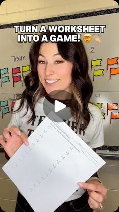 a woman holding up a piece of paper with the words turn a worksheet into a game