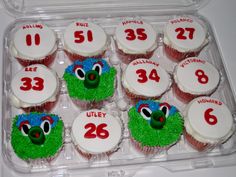 the cupcakes are decorated with numbers and sesame street characters for elmwood elementary school