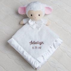 a stuffed animal with a name on it's blanket that says adalynn