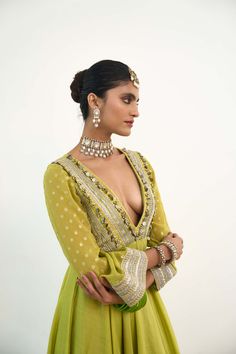 Introducing the asteria anarkali, crafted from a blend of georgette and chanderi silk in a refreshing lime green hue. This ensemble exudes timeless elegance with its flowing silhouette and intricate detailing, promising to make a statement at any event. Elevate your style with the epitome of grace and sophistication. Green Anarkali, Anarkali Suits, Indian Attire, Green Fabric, Anarkali, Indian Outfits, Indian Fashion, Occasion Wear, Lime Green