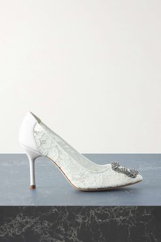 MANOLO BLAHNIK Hangisi 90 embellished corded lace pumps | NET-A-PORTER Manolo Blahnik Lace Heels, Elegant Wedding Shoes With Lace Trim, Elegant Wedding Heels With Lace Trim, Elegant Lace Wedding Shoes, Elegant Heels With Lace Trim, Elegant Heels With Lace Trim And Fitted Design, Elegant Fitted Heels With Lace Trim, Elegant Embellished Heels For Ceremony, Luxury White Wedding Shoes For Reception