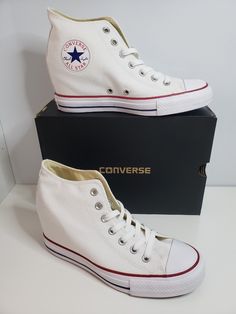 Converse Chuck Taylor All*Star Lux Hidden Heel Wedge White Shoes In Women's Size 9. These are new with original box. Very, very hard to find new. They were only taken out of the box for this listing and pictures. Other than that they've sat new in the original box. Really hard to find, very desirable shoes.  Please see all pictures for further details. They will be shipped double boxed. Shipping USPS Priority Mail. Please see my other listings for New and Pre-owned Converse, Vans, Nike and Adidas. Converse Wedge, Converse High-top Platform Sneakers For Sports, Converse High-top Platform Sneakers, Converse Wedge Sneakers, Converse Sneakers With Cushioned Footbed, Synthetic, White Wedges, Converse Chuck Taylor All Star, Heels & Wedges, Chuck Taylor All Star