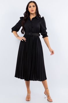 Introducing our stunning black pleated midi dress, perfect for any occasion! This dress features an adorable detached belt, adding a touch of elegance to your look. Our dress also includes a 3/4 sleeve with elastic cuffs, stretch waist and a beautiful pleated skirt for a comfortable and flattering fit. The button down bodice with collar adds a sophisticated touch to this dress. Made with a lightweight woven fabric, you'll feel amazing in this flowy and stunning dress. Model is 5'7"  and wearing Elegant Luxury Black Pleated Dress, Luxury Office Dresses With Pleated Hem, Luxury Formal Midi Length Belted Dress, Luxury Pleated Full Skirt Midi Dress, Luxury Belted Collared Midi Dress, Luxury A-line Belted Dress For Women, Luxury Pleated Waist Fit And Flare Midi Dress, Luxury Black Belted Midi Dress, Luxury Pleated Knee-length Dress