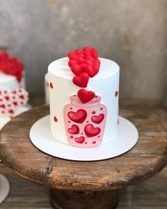 there is a cake with hearts on it