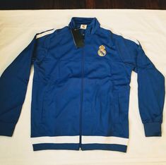 Track Jacket Real Madrid Chamarra Deportiva Blue Color Blue Sportswear Outerwear For Spring, Blue Spring Sportswear Outerwear, Blue Sportswear Track Jacket For Fall, Blue Track Jacket For Sports In Spring, Blue Track Jacket For Fall Sportswear, Blue Track Jacket For Spring Sports, Blue Track Jacket For Fall, Spring Blue Track Jacket For Sports, Blue Spring Sports Outerwear