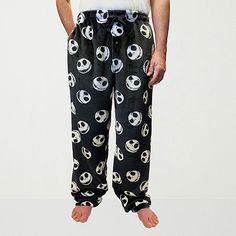 Prep for bedtime in these fun, cozy Nightmare Before Christmas graphic pajama pants for men. Made from a super-soft and warm printed fleece, they have a comfortable elastic-drawstring waist, a button-fly and side pockets. Team it with your favorite pajama top or t-shirt. Features: Button FlyCharacter: Nightmare Before ChristmasClosure Type: Full Elastic, DrawstringPockets: 2 Side Slip PocketsApparel Length: 49.75 InchesFiber Content: 100% PolyesterFabric Description: FleeceInseam: 32 InCare: Mac Nightmare Before Christmas Pyjama, Mens Pajama Pants, Fleece Pajama Pants, Christmas Graphic, Mens Fleece, Pajama Top, Pants Color, Nightmare Before, Pants Black