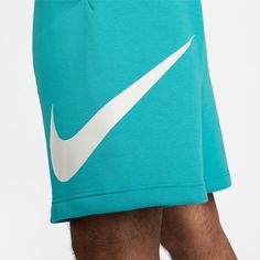 Get ready to get comfy in the Nike Sportswear Club Fleece Shorts. These men's shorts feature a soft fleece fabric lining for a relaxed feel. Side pockets, a relaxed fit a ribbed waistband, and availability in varying colors make them functional for everyday use. Relaxed, easy regular fit from hip to knee. Brushed-back fabric is soft and comfortable. Ribbed waistband with drawcord for an adjustable fit. Side pockets and back pocket. Fabric: 80% cotton, 20% polyester. Machine wash. Imported. Nike Athletic Shorts With Elastic Waistband For Leisure, Comfortable Nike Moisture-wicking Bottoms, Casual Athletic Shorts With Pockets For Jogging, Casual Relaxed Fit Jogging Shorts, Nike Moisture-wicking Shorts For Loungewear, Casual Nike Athletic Shorts For Jogging, Comfortable Nike Athletic Shorts, Nike Sportswear Club Fleece, Soccer Shop